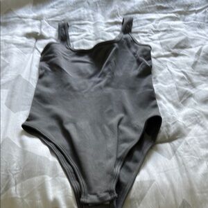 Gray woman’s small bodysuit